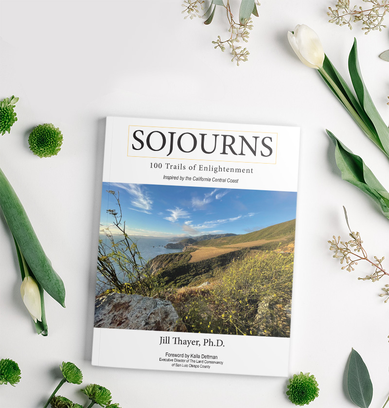 Sojourns: 100 Trails of Enlightenment by Jill Thayer, Ph.D. book cover surrounded by florals